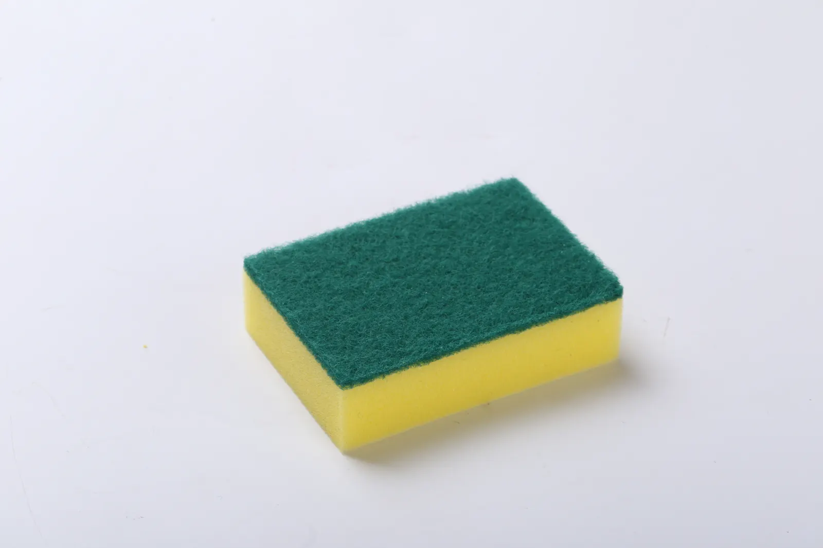 regular scouring pad sponge for comparison with melamine sponge